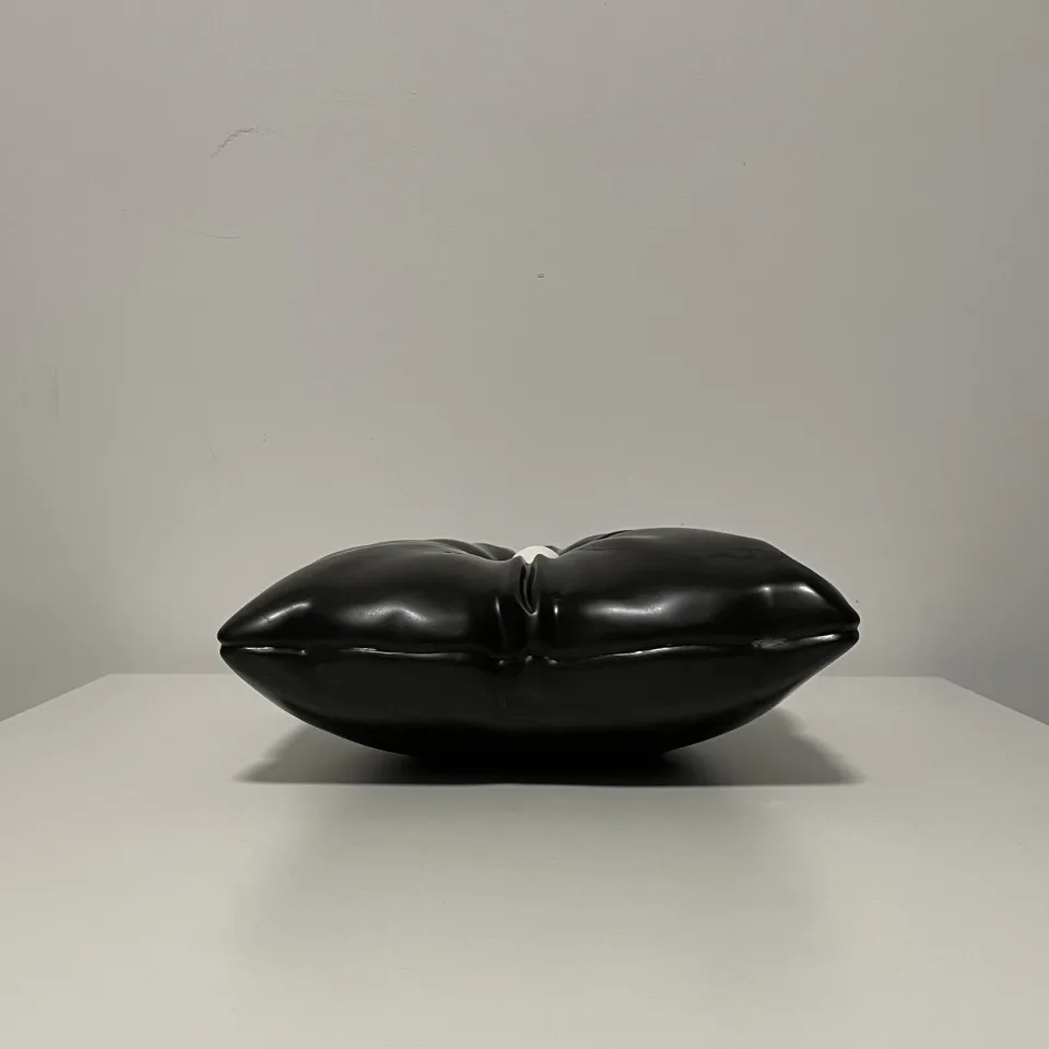The cushion from the side, the ball just visible.